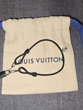 Louis Vuitton Black Cord Strap with LV Round CharmLouis Vuitton LockIt Bracelet
